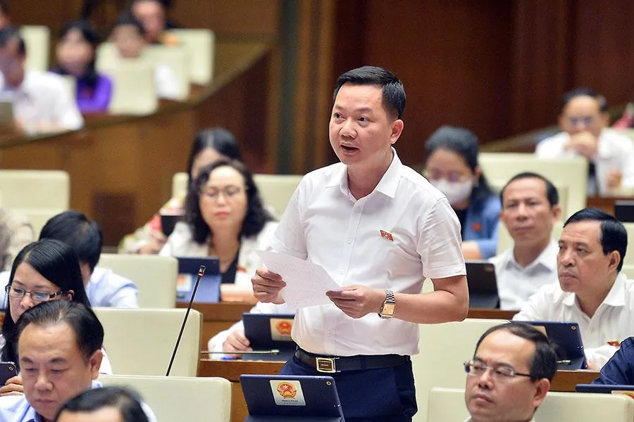 Đại biểu Quốc hội Trịnh Xuân An, tỉnh Đồng Nai đề nghị dành nguồn lực thích đáng cho tổ chức thi hành dân chủ ở cơ sở. Ảnh: QH