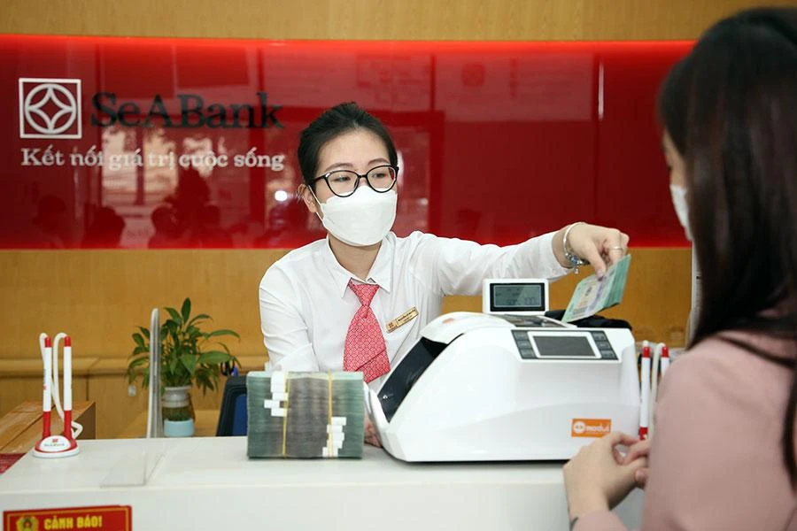 Đồng USD mạnh gây áp lực lên tỉ giá hối đoái của Việt Nam. Ảnh: PM