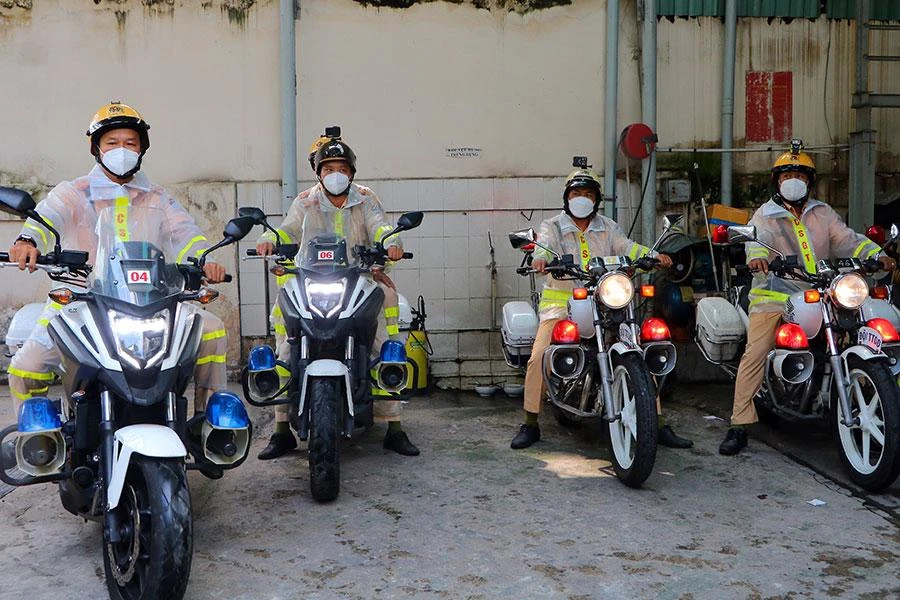 Đội CSGT tuần tra dẫn đoàn Công an TP.HCM ra quân dịp lễ 2-9. Ảnh: BẢO PHƯƠNG