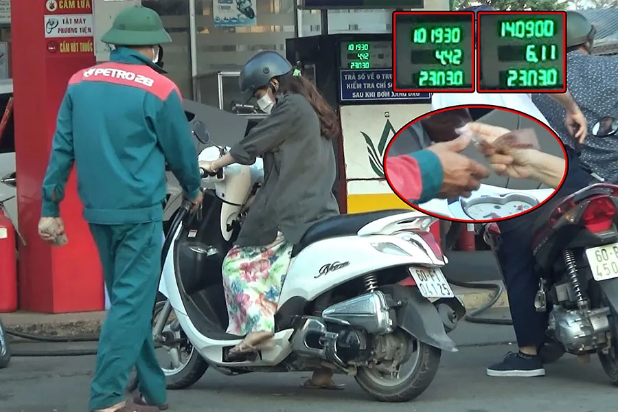 Chiều 31-3, trong lúc khách không chú ý, nhân viên trạm đã bơm nối số và ăn gian 10.000 đồng. Ảnh: YÊN - TÂN