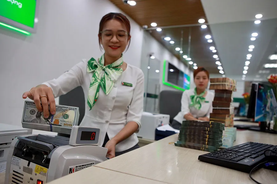 Giá USD tăng liên tục trong những ngày gần đây và đang có xu hướng giảm nhẹ. Ảnh: NGUYỆT NHI