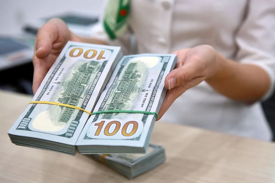 Ngày 18-8, tỉ giá trung tâm của đồng USD ở mức 23.946 VND/USD. Ảnh: NGUYỆT NHI