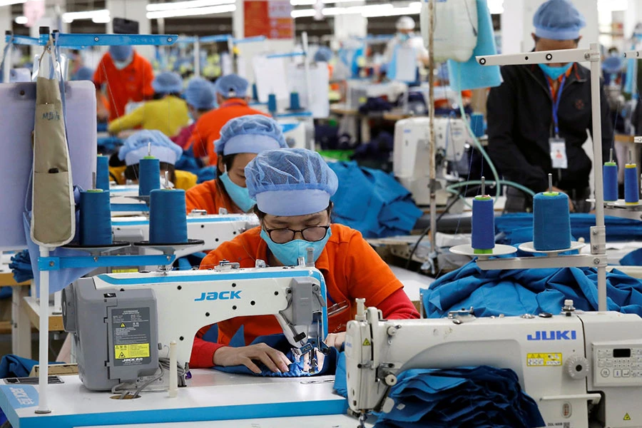 Nếu Mỹ công nhận Việt Nam đạt quy chế kinh tế thị trường vào cuối tháng 7-2024, các doanh nghiệp hai nước sẽ đứng trước nhiều cơ hội lớn. Ảnh: REUTERS Ảnh2_Kinh-te-thi-truong.jpg