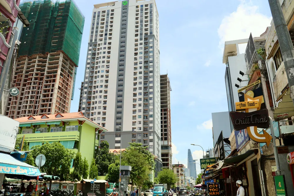 Chung cư 100 Cô Giang, quận 1 được xây mới và bàn giao vào năm 2022. Ảnh: NHƯ NGỌC p89-loat-bai-nha-o-50-nam-bai-1--hinhphu2.jpg