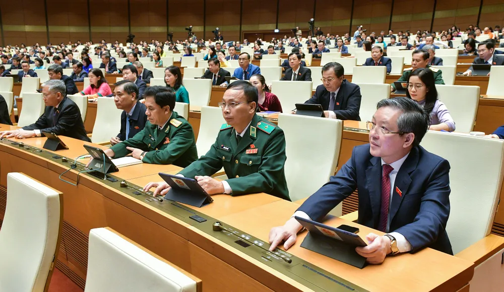 Các đại biểu Quốc hội bấm nút biểu quyết thông qua Nghị quyết về hoạt động chất vấn tại Kỳ họp thứ 7, Quốc hội khóa XV. quoc-hoi-nghi-quyet-chat-van.jpg