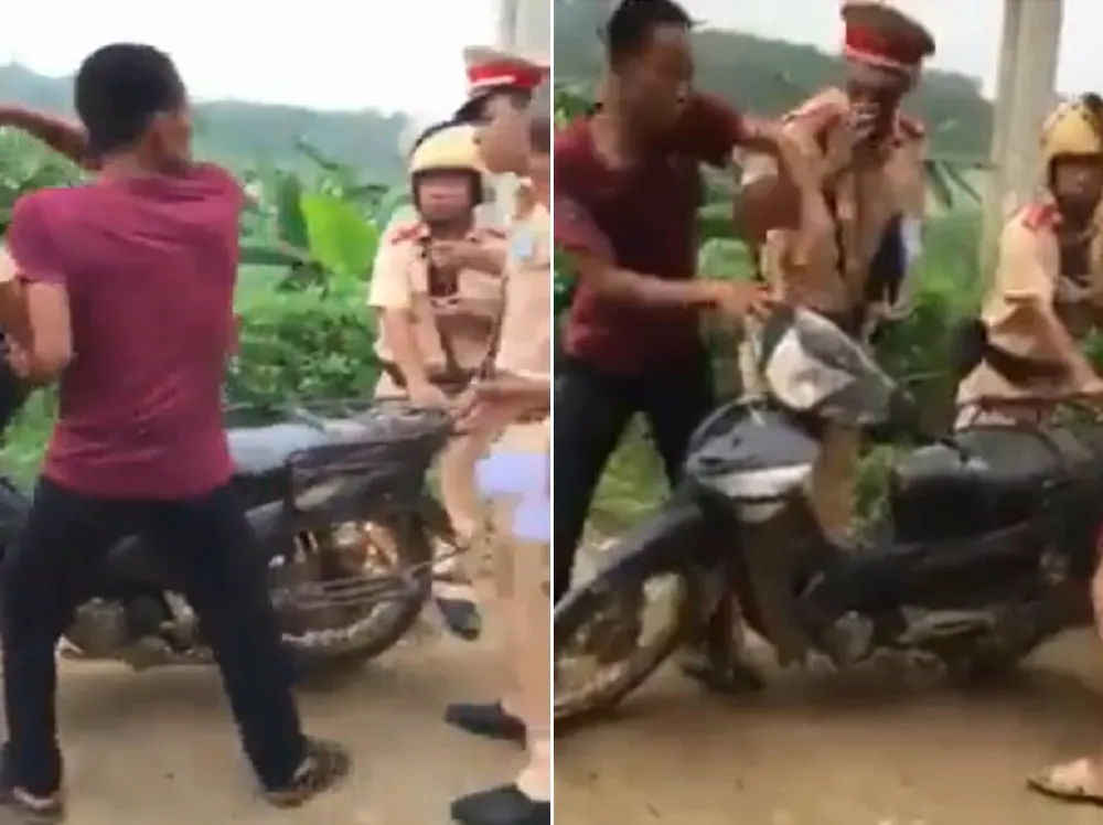 CSGT lên tiếng vụ 'dắt xe máy cũng bị xử phạt' ảnh 1 CSGT lên tiếng vụ 'dắt xe máy cũng bị xử phạt' ảnh 1