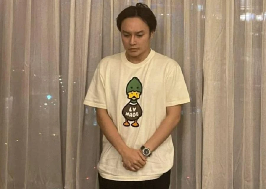 Lê Hoàng Long tại thời điểm bị bắt. Ảnh: CA