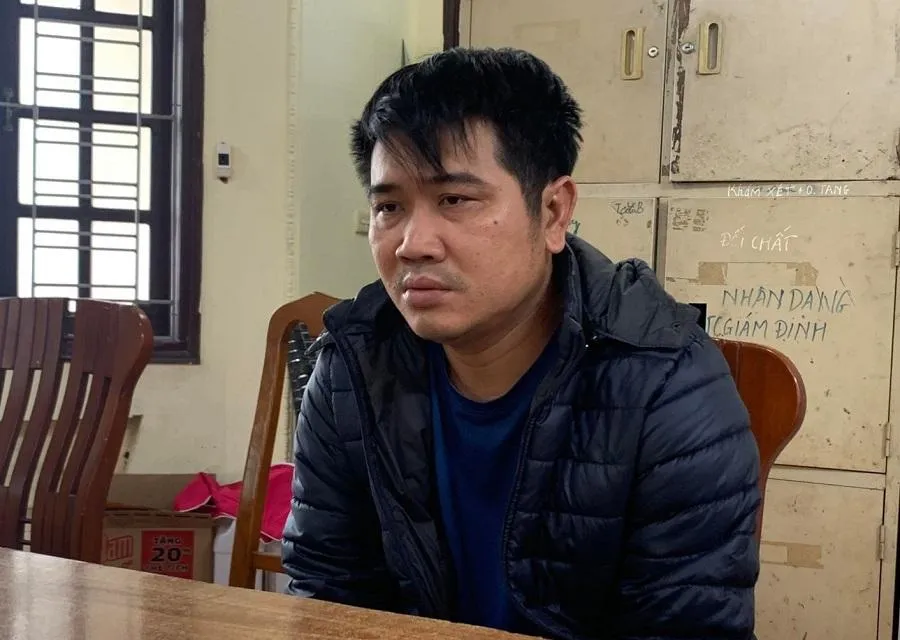 Nguyễn Hoàng Minh tại cơ quan công an. Ảnh: CA