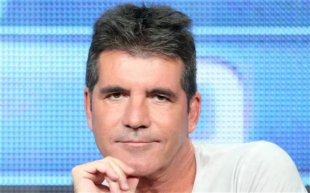 Ông trùm âm nhạc Simon Cowell được cho là người đồng tính ảnh 1