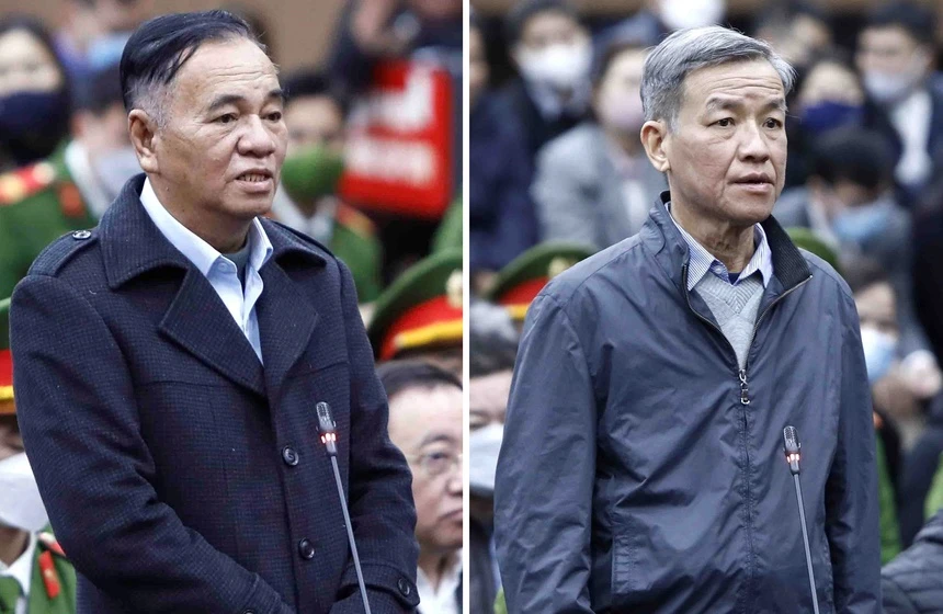 Bị cáo Trần Đình Thành (phải) và bị cáo Đinh Quốc Thái (trái). Ảnh: HOÀNG VIỆT