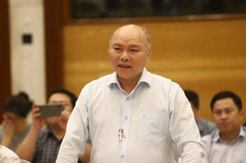 Ông Vũ Đăng Minh, người phát ngôn Bộ Nội vụ thông tin về tiến độ chuẩn bị cải cách tiền lương. Ảnh: TN Bộ Nội vụ thông tin về tiến độ chuẩn bị cải cách tiền lương