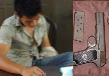 Dùng súng cướp 400.000 đồng (?) ảnh 1