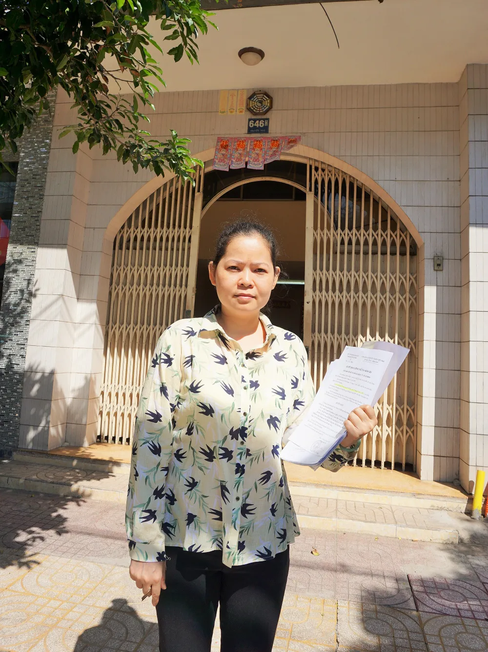 Bà Nguyễn Ngọc Kiều Trang cho rằng Cục THA TP.HCM chưa rõ nghĩa vụ bà phải trả nợ mà đòi bán nhà của bà là trái với pháp luật. Ảnh: N.NGA