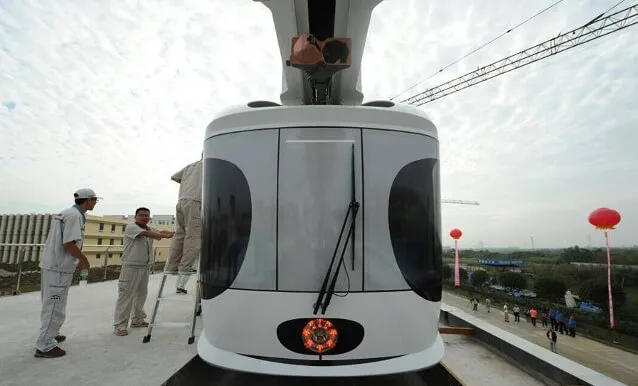 Trung Quốc sắp có tàu lửa 'treo lơ lửng' giữa trời ảnh 2 Trung Quốc sắp có tàu lửa 'treo lơ lững' giữa trời