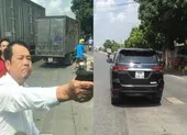 1 giám đốc chĩa súng dọa bắn vì mâu thuẫn giao thông