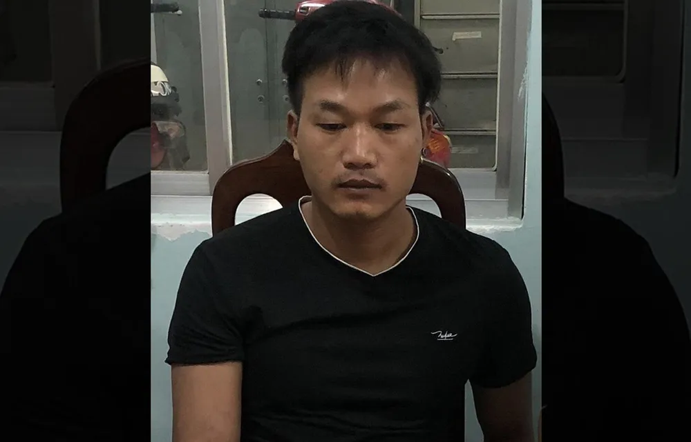 Ngô Quang Hữu bị bắt sau tám năm bỏ trốn. Ảnh: CA