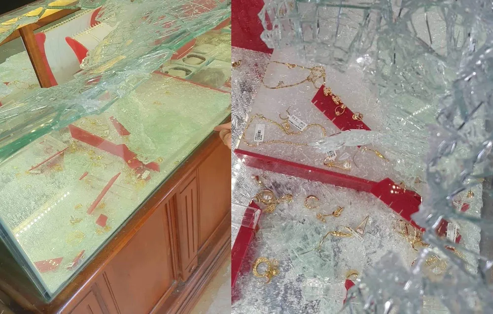 Nghi phạm Tú dùng cuốc đập bể tủ kính, lấy vàng. Ảnh: CA