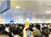 'Giải cứu' tạm thời ùn tắc tại sân bay Tân Sơn Nhất ảnh 3 Ùn tắc kinh hoàng tại khu soi chiếu sân bay Tân Sơn Nhất