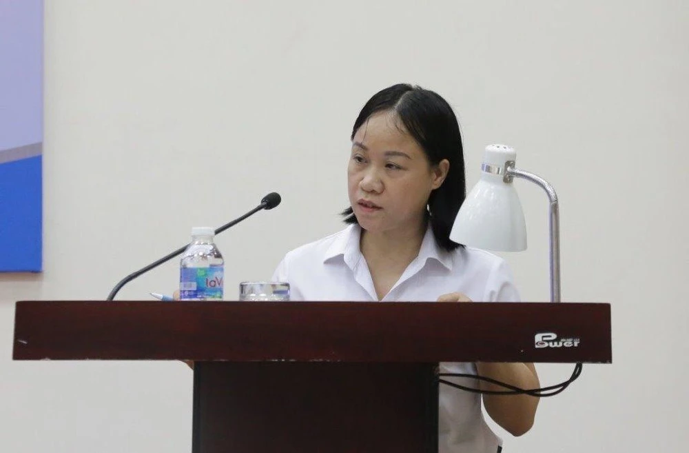 Phó Trưởng ban thực hiện chính sách BHXH - bà Đinh Thị Thu Hiền. Ảnh: M.TRÚC