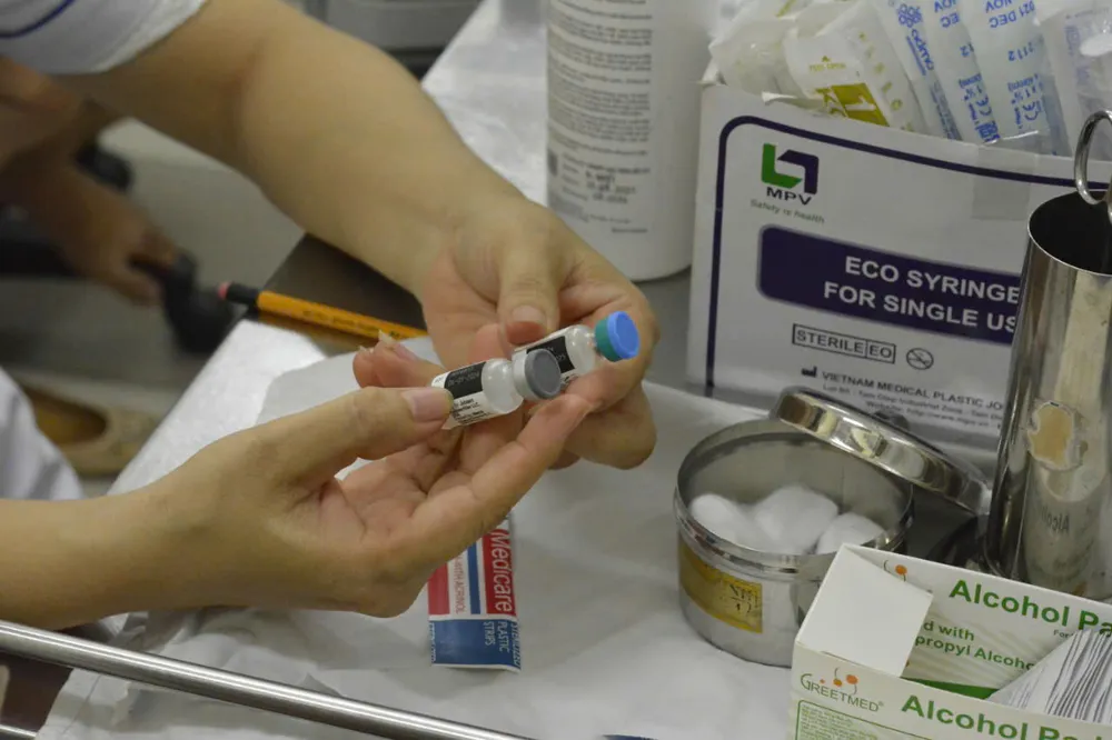 Tiêm vaccine sởi giúp bảo vệ trẻ trước dịch sởi. Ảnh: THẢO PHƯƠNG tiem-vaccine-soi-1.jpg