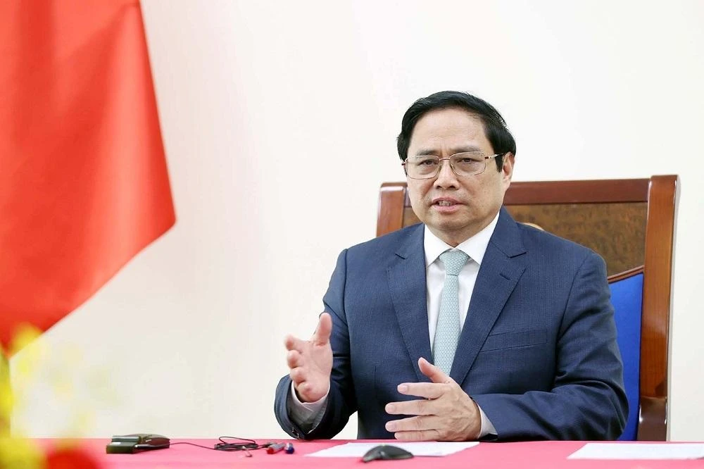 Thủ tướng Phạm Minh Chính điện đàm với Thủ tướng Australia Anthony Albanese. Ảnh: TTXVN.