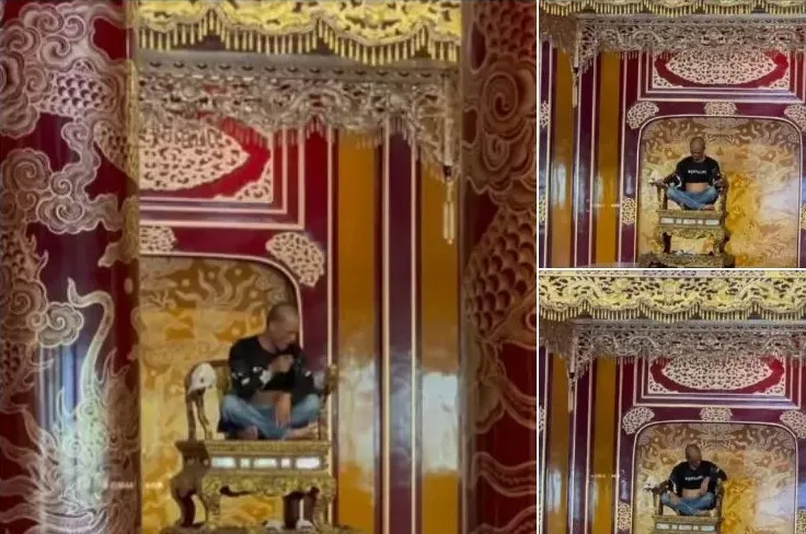 Người đàn ông 42 tuổi với biểu hiện bất thường đã ngồi lên ngai vàng triều Nguyễn trong điện Thái Hòa (Đại nội Huế) la hét, làm gãy một phần cổ vật này. Ảnh chụp màn hình. cuc-di-san-van-hoa-ra-van-ban-sau-vu-nguoi-dan-ong-ngoi-len-ngai-vang-o-hue-3.jpg