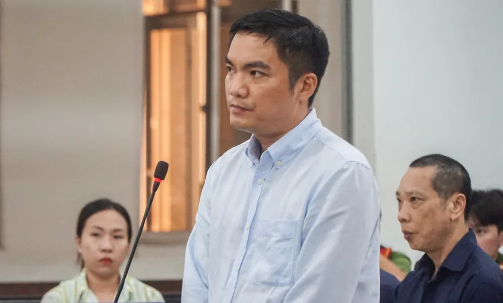 Bị cáo Lường Tiến Quân, cựu cán bộ Bộ Công an tại tòa. Ảnh: XH Bộ Công an.jpg