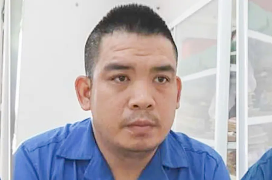 Lê Như Bảo tại cơ quan công an. Ảnh: VT 9.jpg