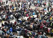 Nhiễm mới tại Trung Quốc tăng vọt đến gần 100 người ảnh 4 Bao nhiêu người đã rời Vũ Hán trong ngày đầu dỡ bỏ phong tỏa?