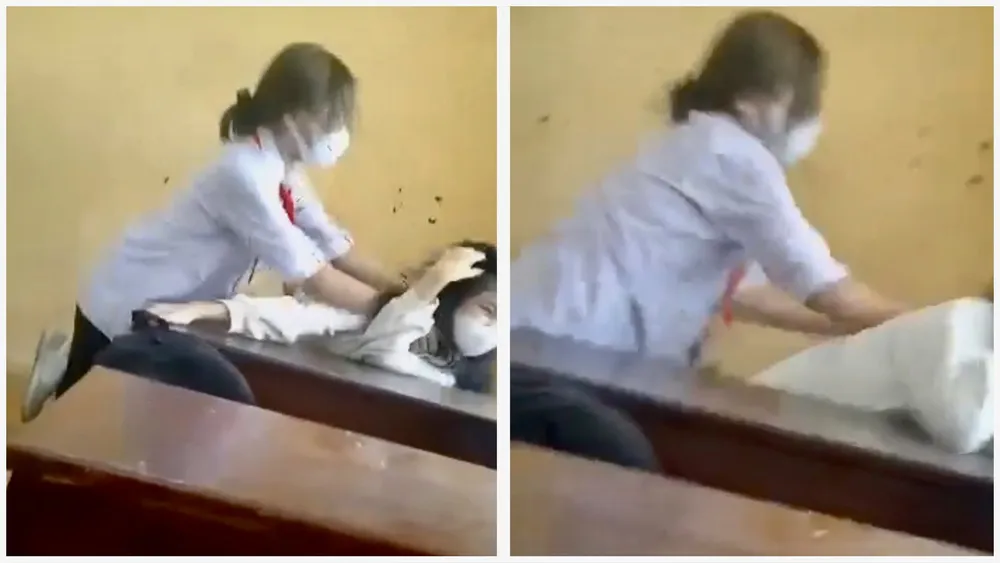 Nữ sinh bị bạn cùng lớp hành hung ngay trong phòng học. Ảnh từ clip