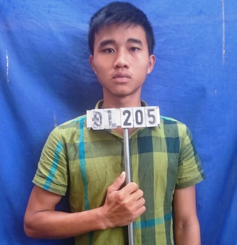 Bị can Nguyễn Hàm Thắng tại cơ quan công an.