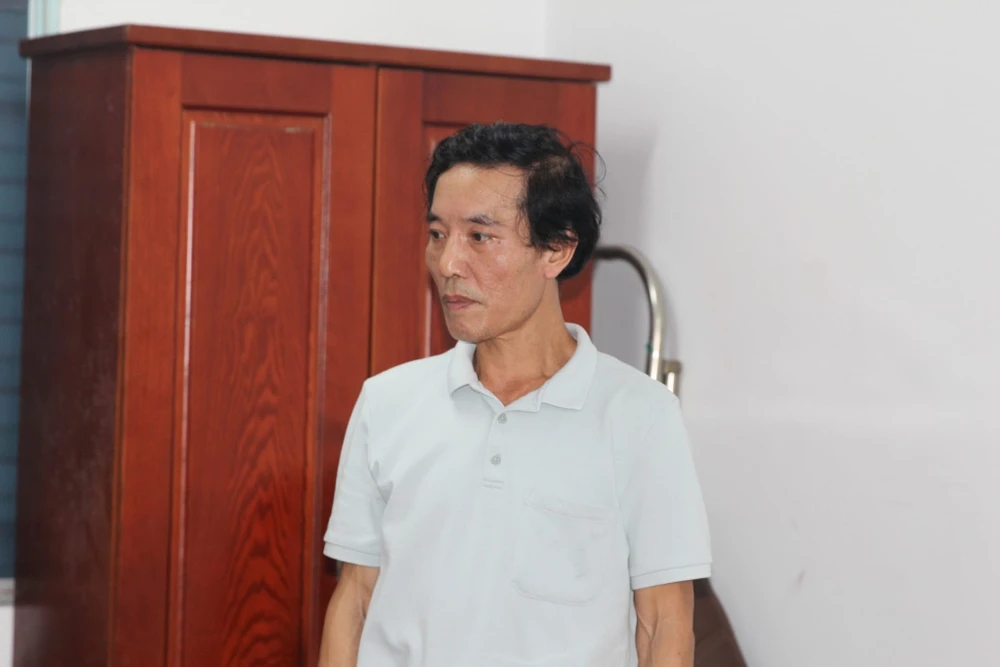 Bị can Nguyễn Chí Nguyện. Cua-Lo-bi-can.jpg