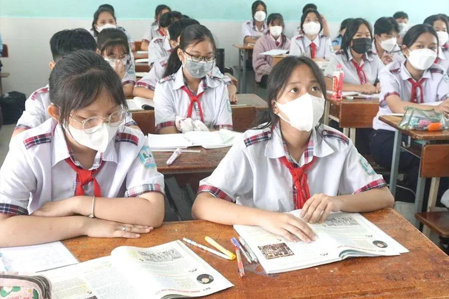 Học sinh Trường THCS Lý Tự Trọng (quận Gò Vấp) trong một tiết học. Ảnh: NGUYỄN QUYÊN