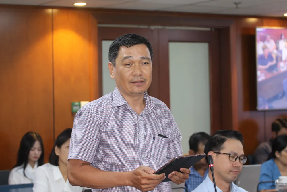 Ông Nguyễn Kiên Giang, đại diện Sở GTVT thông tin tại họp báo. Ảnh: THÀNH NHÂN thí điểm bỏ đếm giây