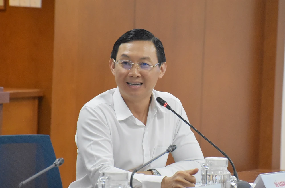 Giám đốc Sở Ngoại vụ TP.HCM Trần Phước Anh thông tin về chương trình Đối thoại Hữu nghị TP.HCM. Ảnh: BẢO PHƯƠNG doi-thoai-huu-nghi-2.JPG