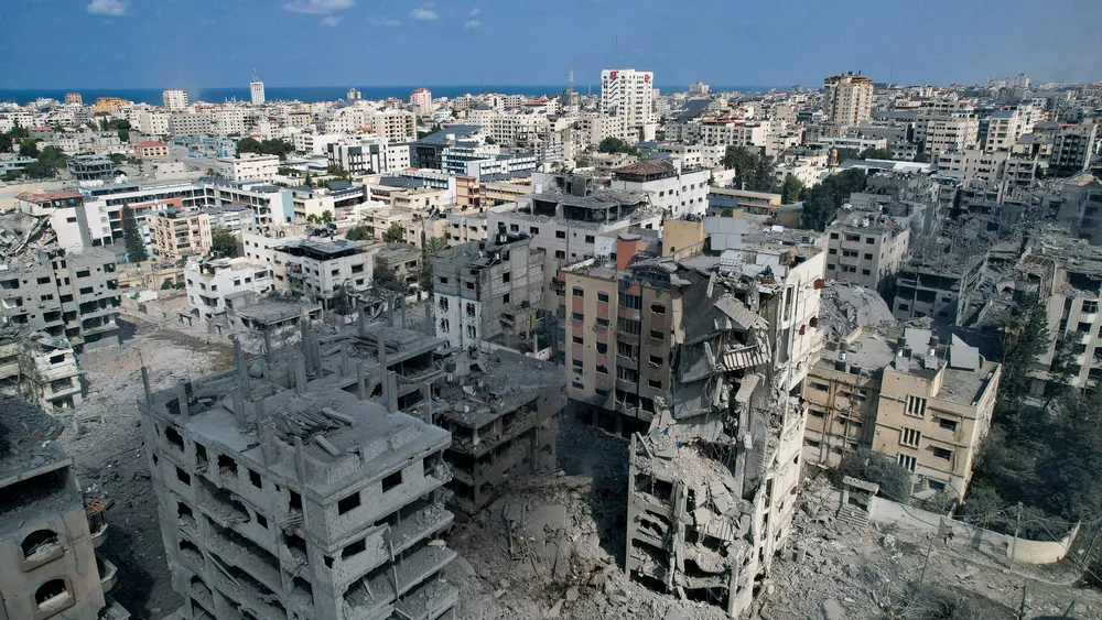 Một khu vực ở Dải Gaza sau khi bị trúng pháo kích. Ảnh: REUTERS 36e3eb7c-164d-4152-a0d4-1401e70735a3.jpg