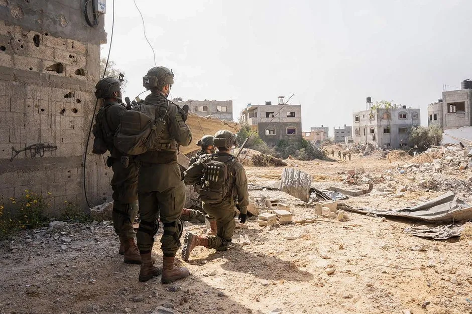 Binh sĩ Israel tại Gaza hôm 16-4. Ảnh: AFP e937a7969f304e643545b44610e448ad189b3bce.jpg