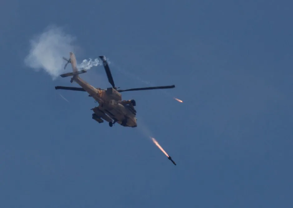 Trực thăng Israel tham gia cuộc chiến ở Gaza, vào ngày 14-5. Ảnh: REUTERS Cuộc chiến ở Gaza