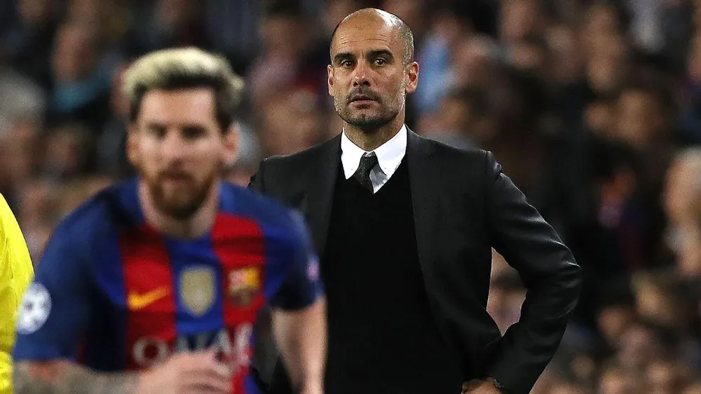 HLV Pep Guardiola có ý định chiêu mộ Messi đá cặp với Haaland trong mùa giải sau cho Man City. Ảnh: GETTY.