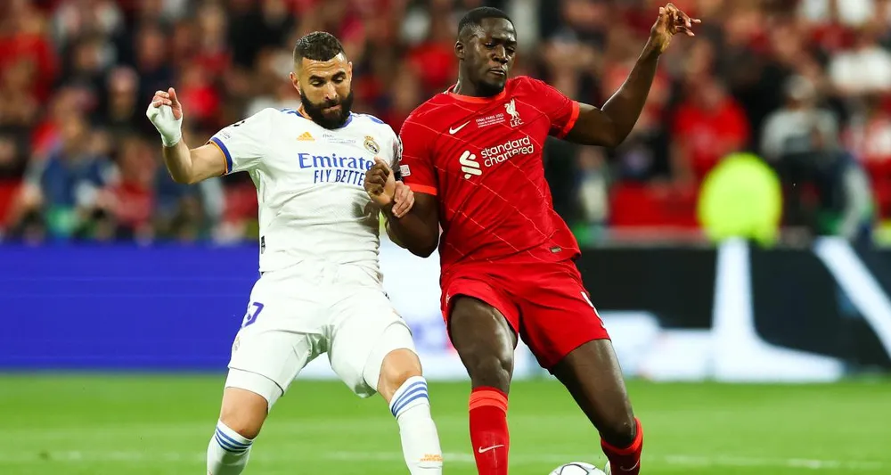 Benzema trở thành chân sút ghi nhiều bàn thắng nhất vào lưới Liverpool ở đấu trường Champions League. Ảnh: GETTY. Benzema trở thành chân sút ghi nhiều bàn thắng nhất vào lưới Liverpool ở đấu trường Champions League. Ảnh: GETTY.