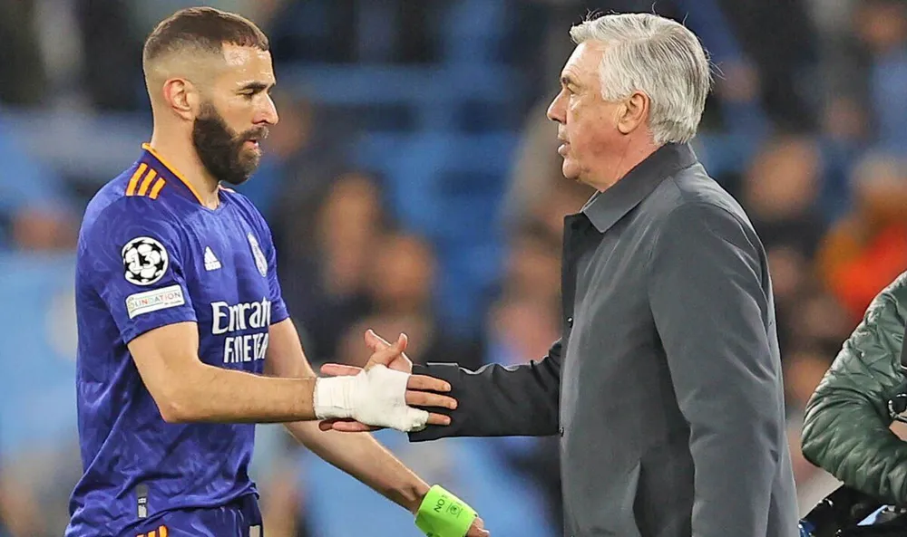HLV Ancelotti nhờ rất nhiều sự đóng góp của Benzema và cũng hồi hộp với tiền sử chấn thương của chân sút người Pháp. Ảnh: GETTY. HLV Ancelotti nhờ rất nhiều sự đóng góp của Benzema và cũng hồi hộp với tiền sử chấn thương của chân sút người Pháp. Ảnh: GETTY.