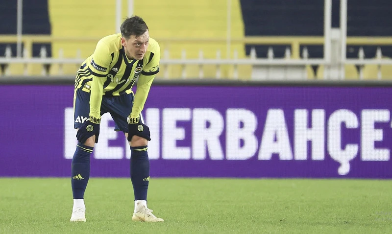 Ozil giã từ sự nghiệp bóng đá sau một khoảng thời gian dài không suôn sẻ. Ảnh: GETTY.