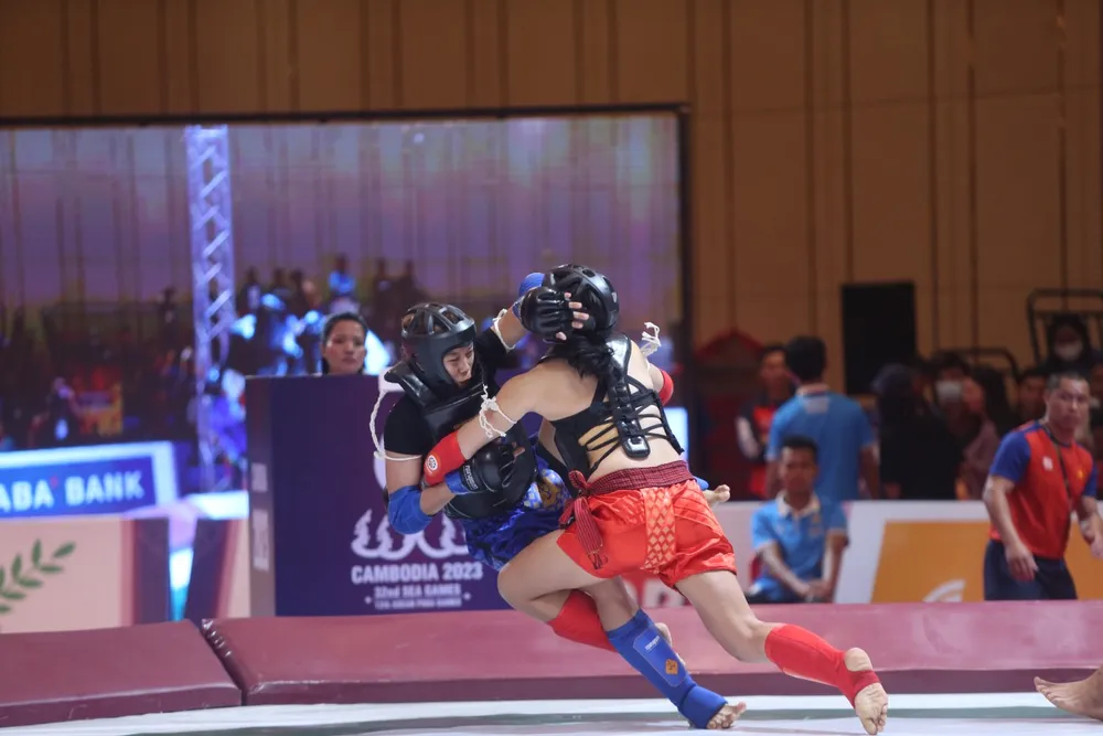 Trần Võ Song Thương thi đấu hạng 60kg nữ hạ knock out đối thủ Meri Ann Geli (Philippines) đầu hiệp hai, giành HCV môn võ Kun Bokator. Ảnh: ANH PHƯƠNG. Trần Võ Song Thương thi đấu hạng 60kg nữ hạ knock out đối thủ Meri Ann Geli (Philippines) đầu hiệp hai, giành HCV môn võ Kun Bokator. Ảnh: ANH PHƯƠNG.