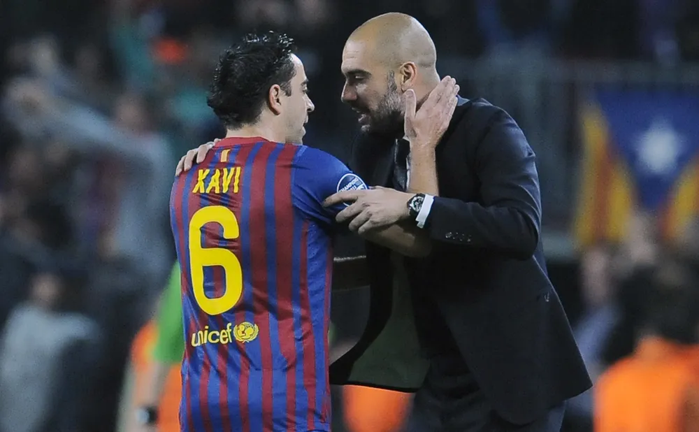 HLV Xavi tức giận với thầy cũ Pep Guardiola từ những chiêu trò cản trở Barca. Ảnh: GETTY.