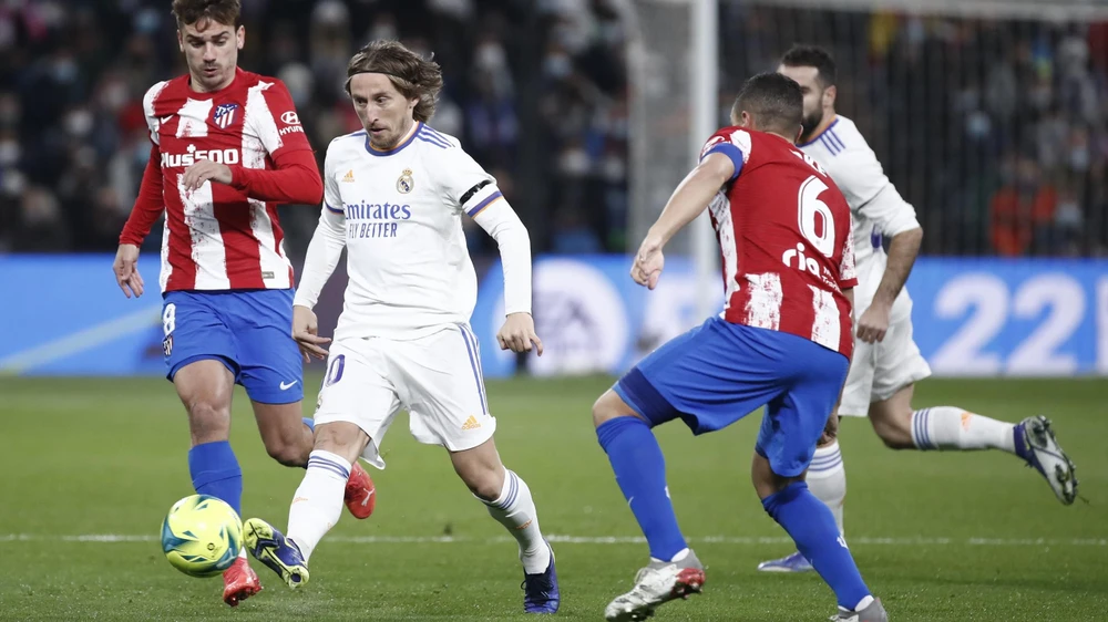 Quả bóng vàng 2018 chơi không tốt như kỳ vọng của đội bóng lớn Tây Ban Nha. Ảnh: GETTY. Luka-modric-ancelotti.jpg