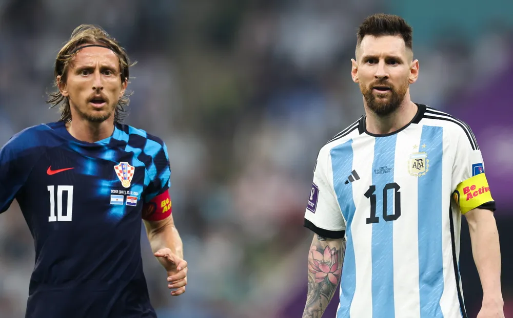 Tiền vệ sáng tạo người Croatia nhiều khả năng sẽ chọn bến đỗ mới như Messi. Ảnh: GETTY. modric-messi.jpg