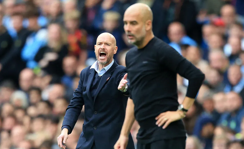 HLV Ten Hag và đồng nghiệp Pep Guardiola đối đầu nảy lửa. Ảnh: GETTY. pep-ten-hag.jpg
