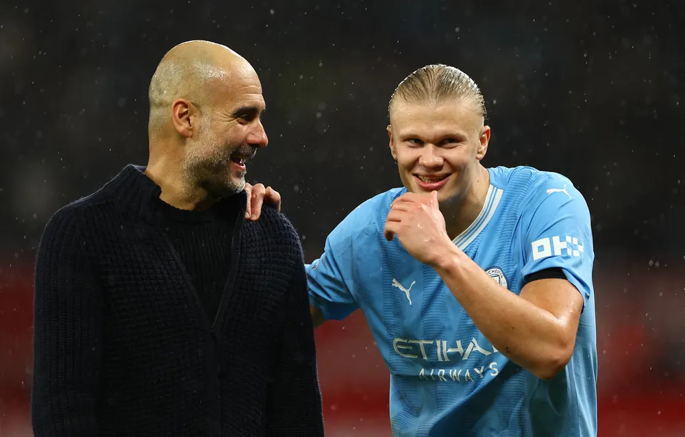 Haaland lập cú đúp có tính chất kết liễu số phận cuộc chơi cho đội bóng của HLV Pep Guardiola. Ảnh: GETTY. haalan-pep.png