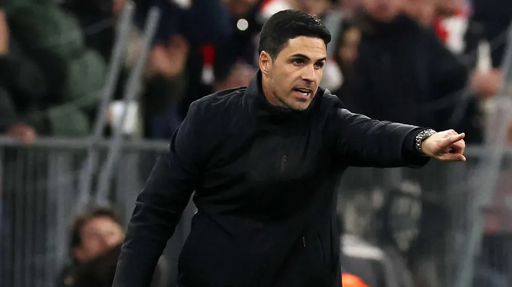 HLV Arteta buồn bã sau khi Arsenal dừng cuộc chơi ở tứ kết Champions League. Ảnh: GETTY. Champions League