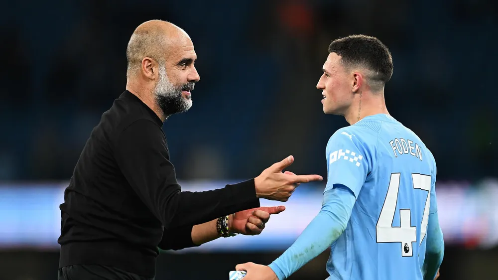 Phil Foden tỏa sáng với cú đúp vào lưới Brighton. Ảnh: GETTY. hlv-pep-guardiola-canh-bao-nguy-co-cua-man-city-va-arsenal (2).jpg